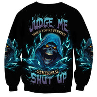 Black unisex sweatshirt with blue reaper skull graphic and glowing electric streaks