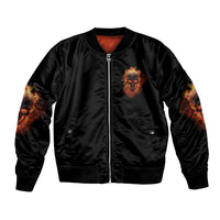 Black bomber jacket with front zipper and small monster face patch, ribbed cuffs and hem.