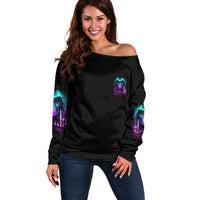 Black off-shoulder sweater with purple-blue skull chest print and long sleeves
