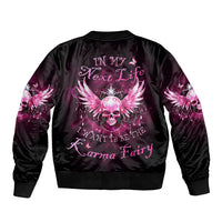 Black satin bomber jacket with pink skull fairy graphic on back