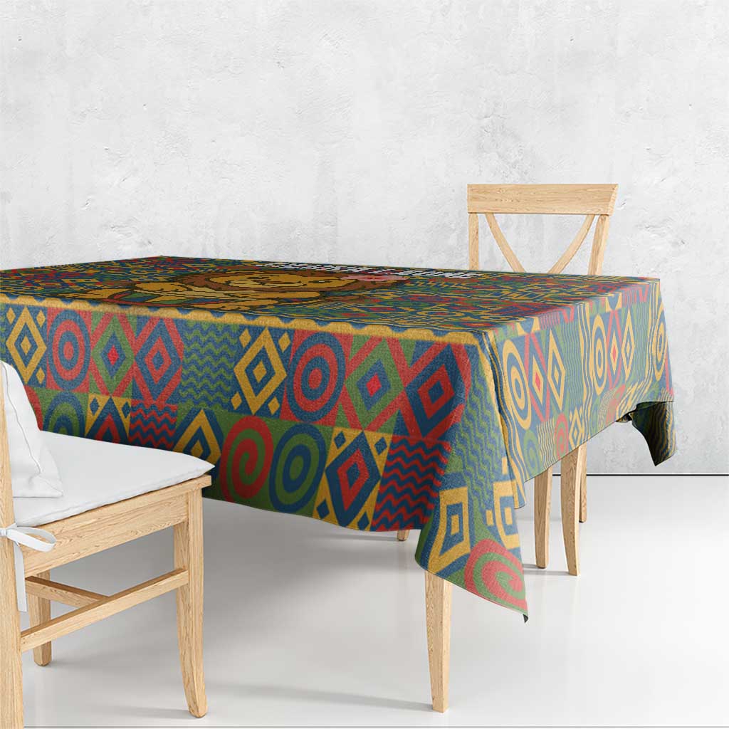 Multicolor tribal tablecloth with diamond and swirl motifs, corner drape