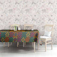 Multicolor tribal-pattern tablecloth with repeating diamond and swirl designs
