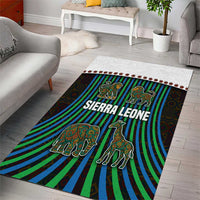 Multicolor rectangular area rug with striped tribal rays and animal figures: lion, elephant