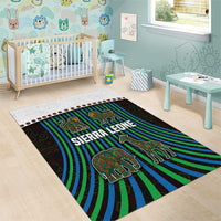 Rectangular area rug with tribal animal artwork: lion, elephant, giraffe and monkey