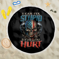 Fringed round black beach blanket with skull, patriotic shield, and text graphic