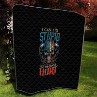 Black quilt with diamond stitching and centered skull artwork with blue and red text.