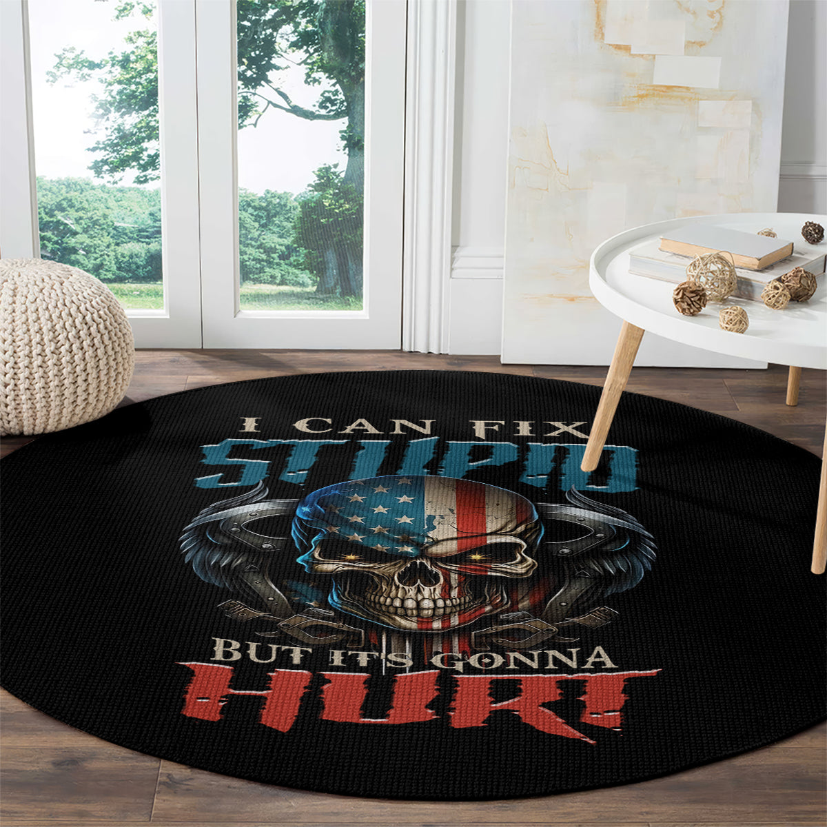 Round black graphic rug with skull and wings, blue emblem and red quote text