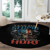 Round black graphic rug with skull and wings, blue emblem and red quote text