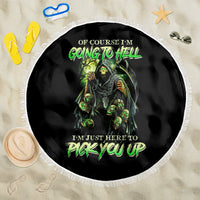 Round black beach blanket with green skull design and white fringed border
