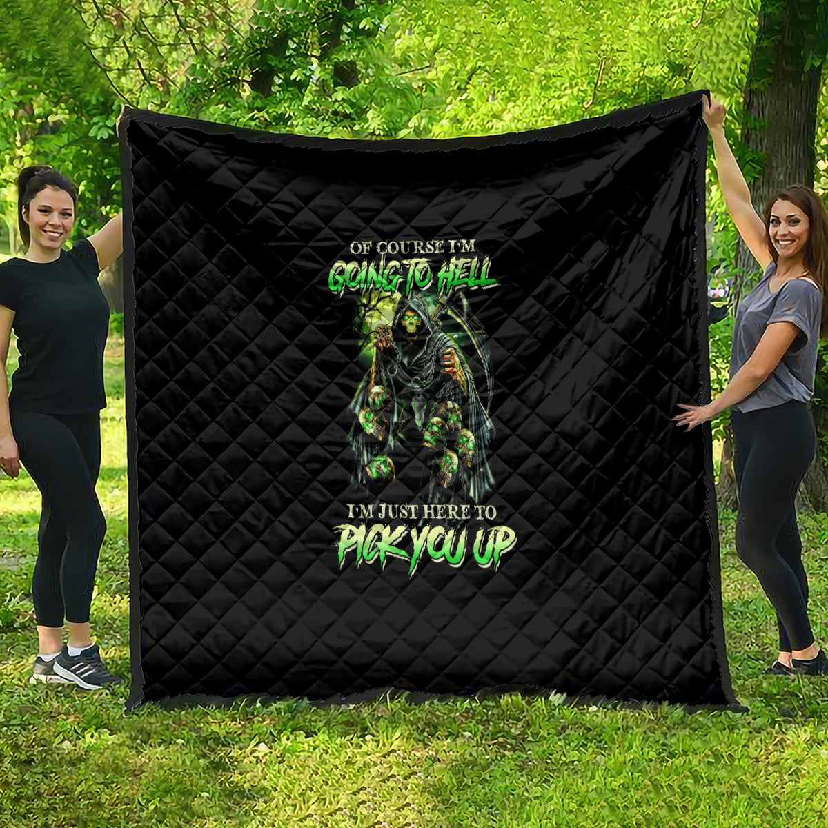 Black quilt blanket with diamond stitching and green skull graphic, text centered