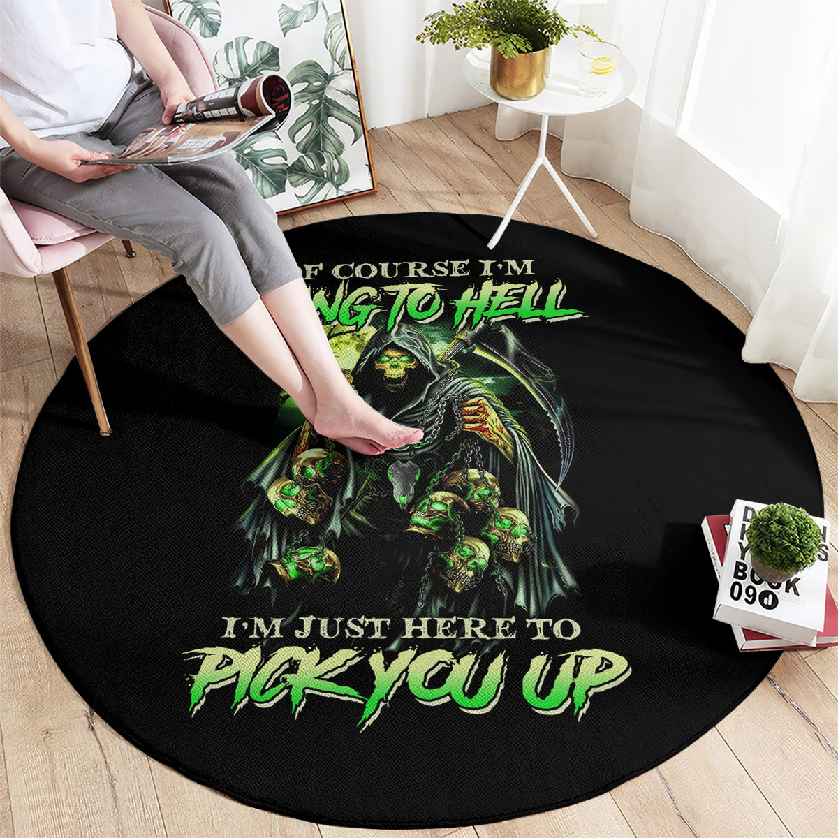 Black round carpet with multicolor skull angel graphic and bold green text