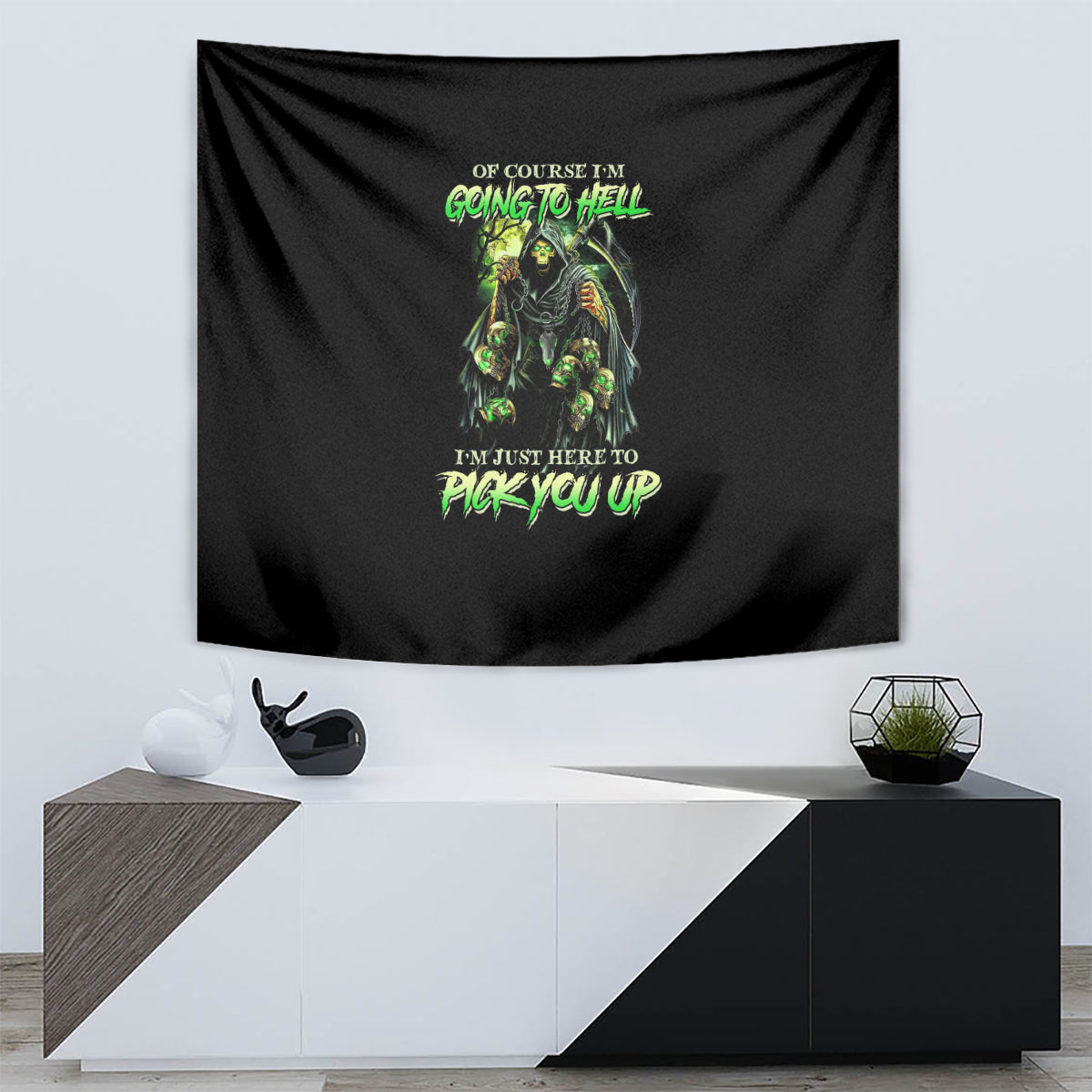 Black skull graphic tapestry with green neon figure and stylized text near center
