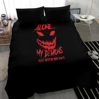 Black bedding set with red skull print and text on duvet and two pillowcases