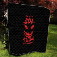 Black quilt blanket with red devil skull graphic and text, rounded top corners