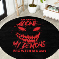 Round black carpet with large red demon graphic and slogan text, centered print