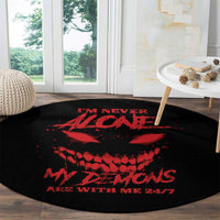 Round black carpet with centered red demon graphic and “24/7” text