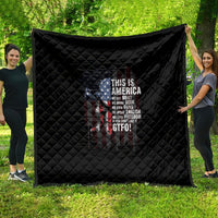 Black quilt with diamond stitching and patriotic skull graphic, 'THIS IS AMERICA' text