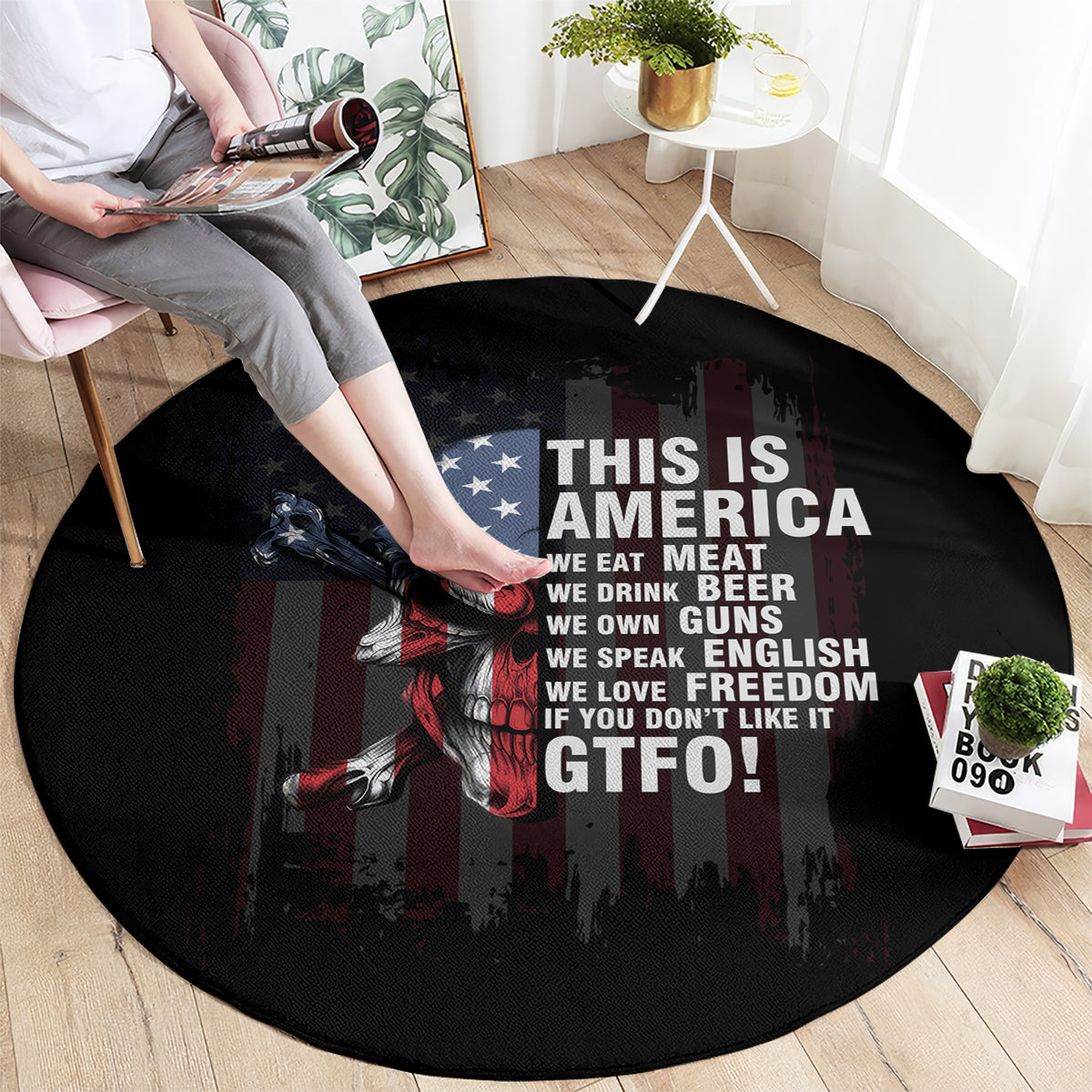 Black round area rug with skull graphic and patriotic “THIS IS AMERICA” text