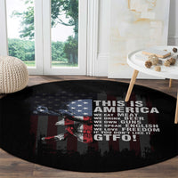 Black round carpet with skull and American flag stripes, “THIS IS AMERICA” lettering