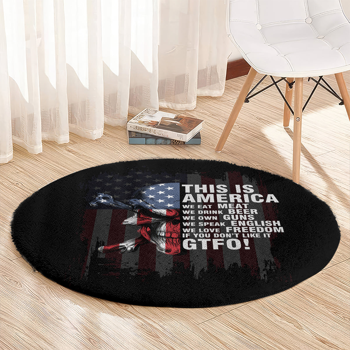Black oval-shaped round rug with skull graphic and “THIS IS AMERICA” message