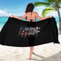 Black sarong with large 'THIS IS AMERICA' skull-and-flag graphic, draped wide