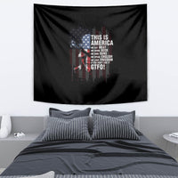 Patriotic wall tapestry with black backdrop, American flag graphic and bold slogan text