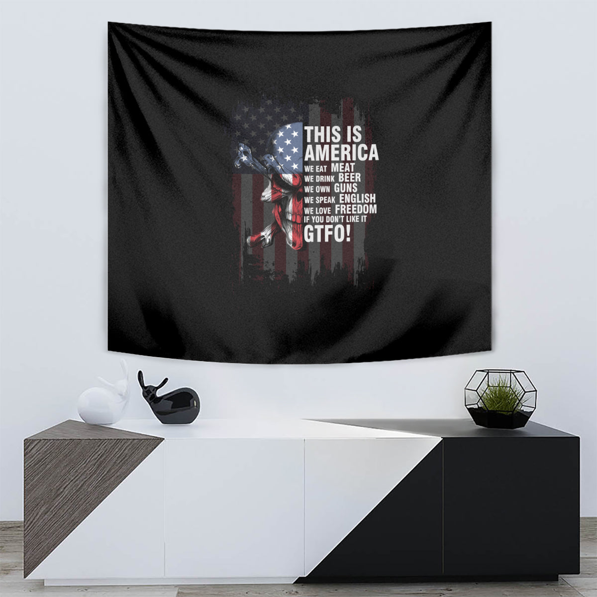 Patriotic wall tapestry showing black background with American flag design and “THIS IS AMERICA” text