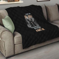 Black sofa throw quilt with diamond quilting and reaper skull graphic with orange accents