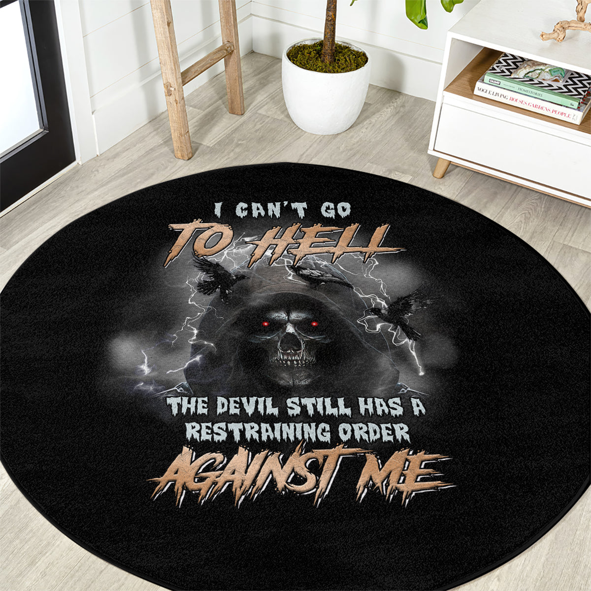 Black round carpet with central skull graphic, bat wings, and hell-themed text