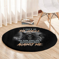Black round carpet with skull and bat-wings design, hell-themed slogan typography