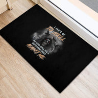 Black rubber doormat with reaper skull graphic and fiery orange/gold text design