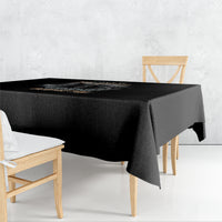 Black Halloween reaper graphic tablecloth, draped over a square dining table