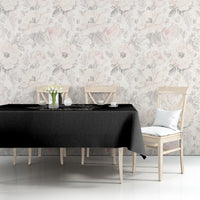 Black reaper graphic tablecloth on a dining table with a vase and cups
