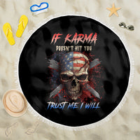 Round black beach blanket featuring skull artwork and multicolor text, with white fringe border