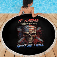 Round beach blanket laid flat: black skull graphic with multicolor text and white tassel fringe