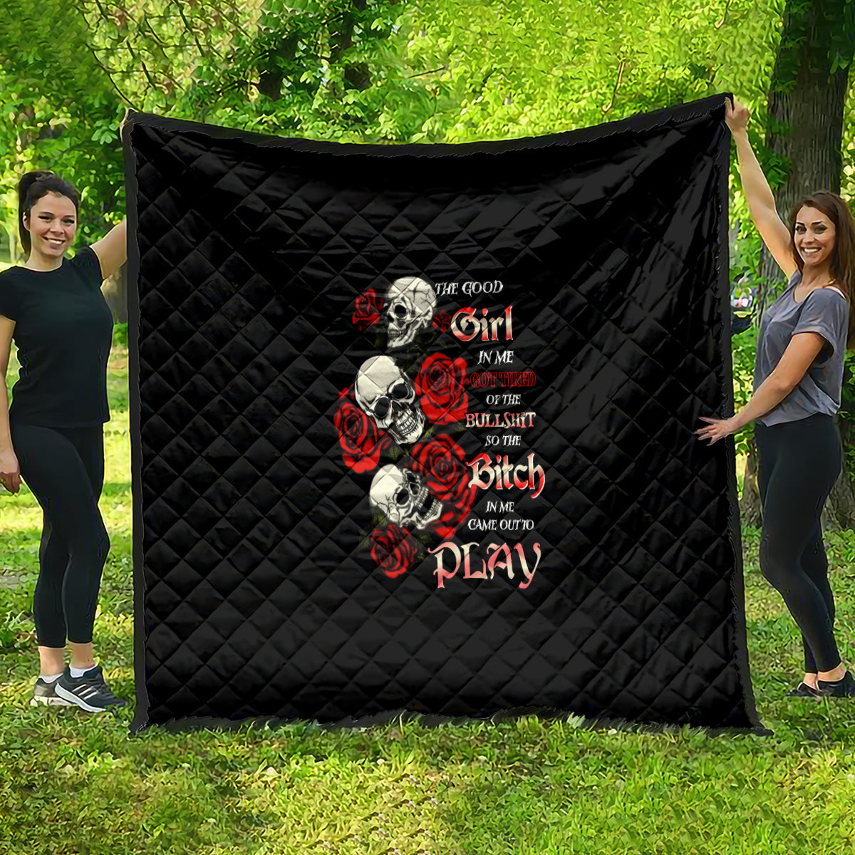 Black quilt with diamond stitching and red rose skull typography design