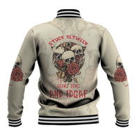 Beige back graphic baseball jacket with skull roses, red lettering, and striped ribbed hem