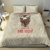 Cream skull bedding set with skull-and-rose design and 'IDK IDGAF' text on duvet
