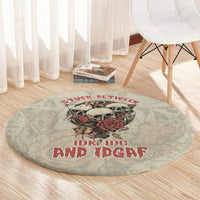 Round area rug with skull and red rose design plus red text on light gray