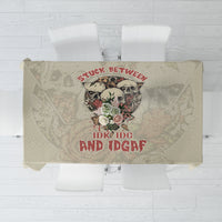 Rectangular tablecloth in light beige with centered multicolor skull and slogan print