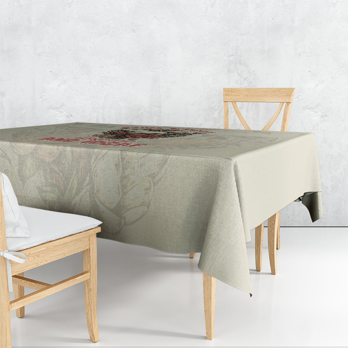 Square tablecloth in light beige with multicolor skull graphic and band lettering