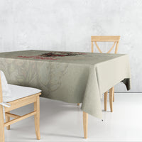 Square tablecloth in light beige with multicolor skull graphic and band lettering