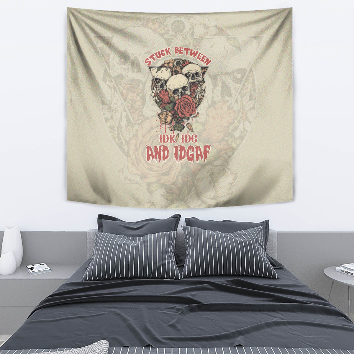 Beige skull and rose wall tapestry with multicolor graphic and bold red lettering