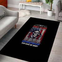 Black area rug with skull graphic and red, white, blue text design