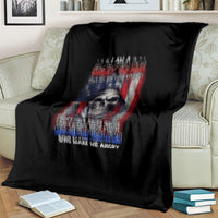 Black graphic blanket with large skull artwork and bold patriotic lettering