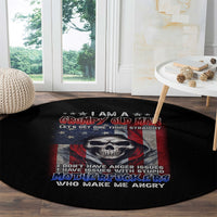 Round black rug with grumpy old man skull emblem and red-blue star flag center print
