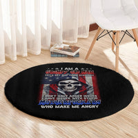Round black floor rug with grumpy old man skull graphic and red-blue flag typography