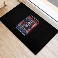 Black rubber doormat with skull and text graphic, rectangular floor mat.