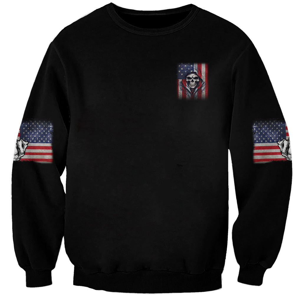 Black unisex sweatshirt with small skull graphic and American flag sleeve patches