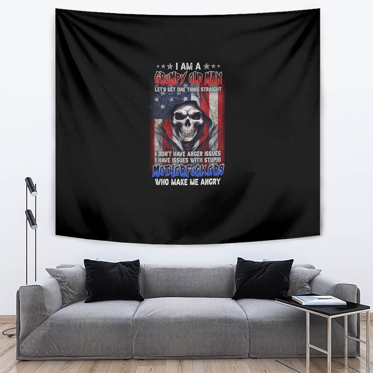 Black tapestry wall hanging with central skull illustration and colorful slogan text